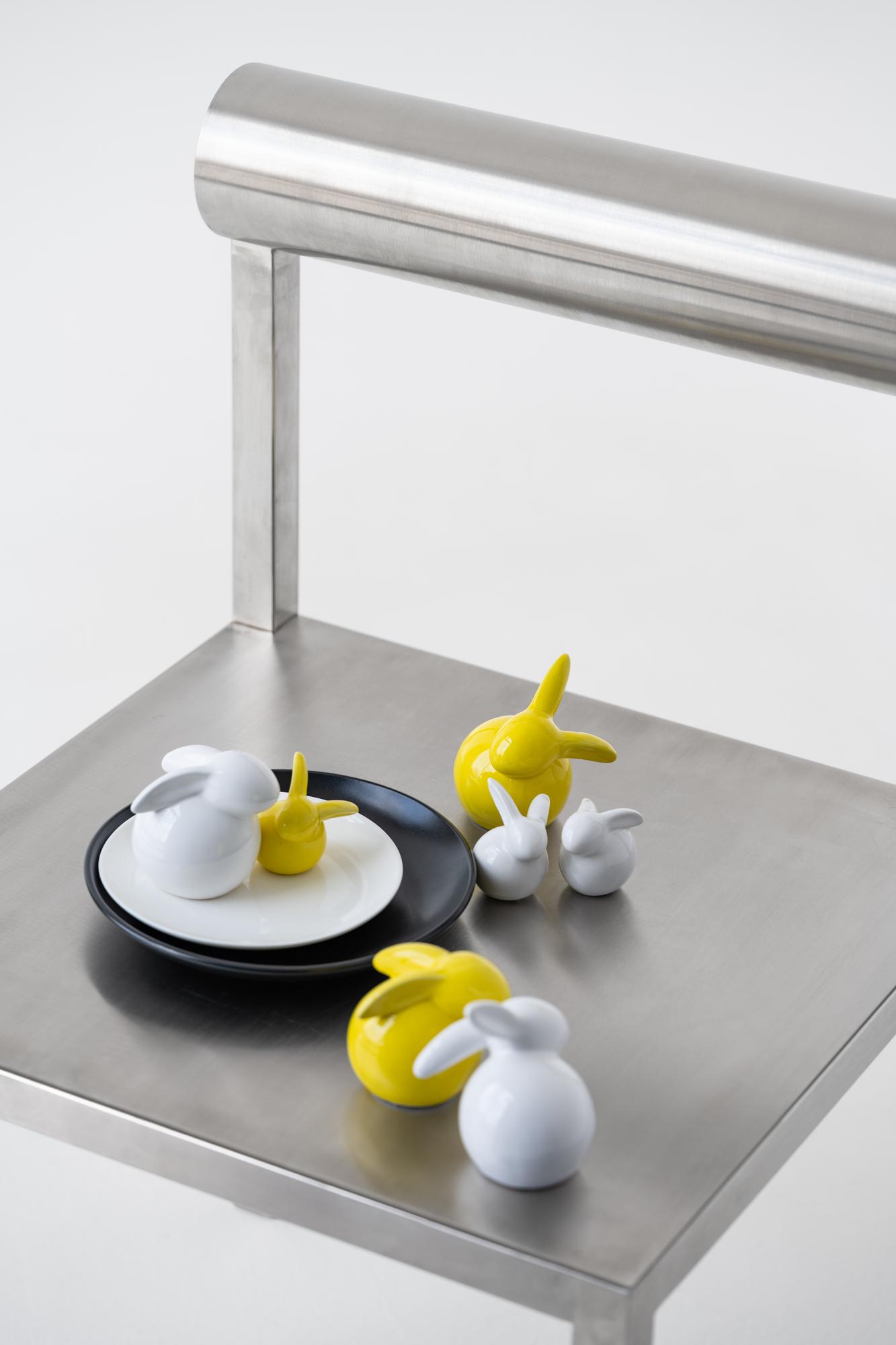 Minimal laboratory-style kitchen bench with plated food