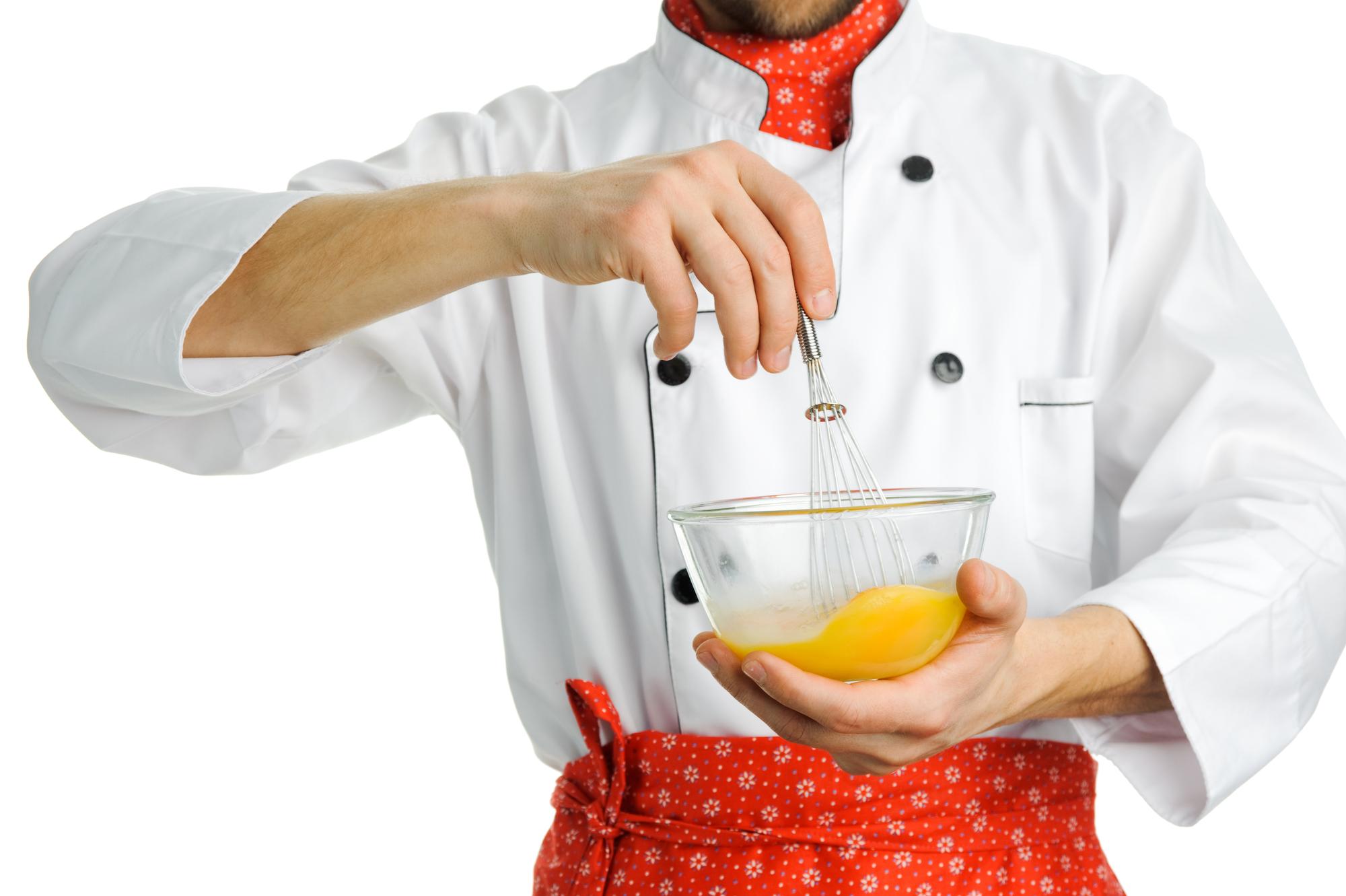 Chef hands finishing a quick sauce